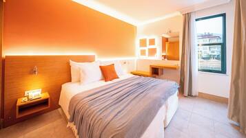 Standaard studio | Een kluis op de kamer, een strijkplank/strijkijzer, gratis babybedden