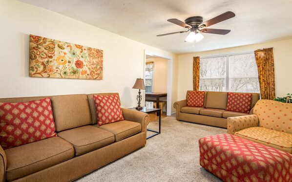 Family Suite, 2 Bedrooms | Living room | Flat-screen TV