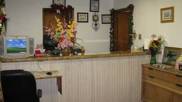 Kios check-in/check-out