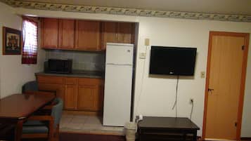 Standard Double Room, 2 Double Beds, Smoking | Living area | Flat-screen TV