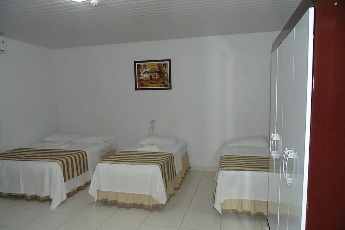 Standard Triple Room | Living area | TV