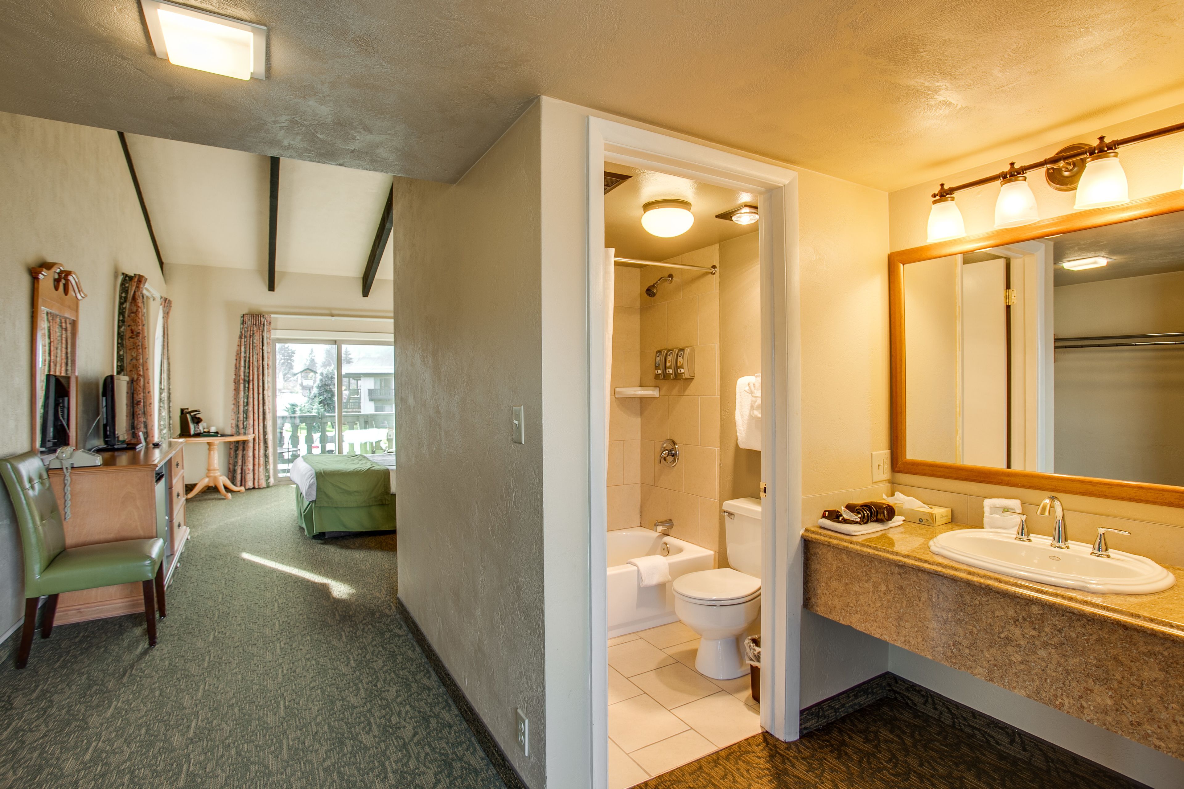 combined shower/bathtub, free toiletries, hair dryer, towels