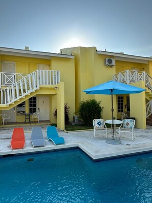 Outdoor pool, open 8:00 AM to 8:00 PM, sun loungers