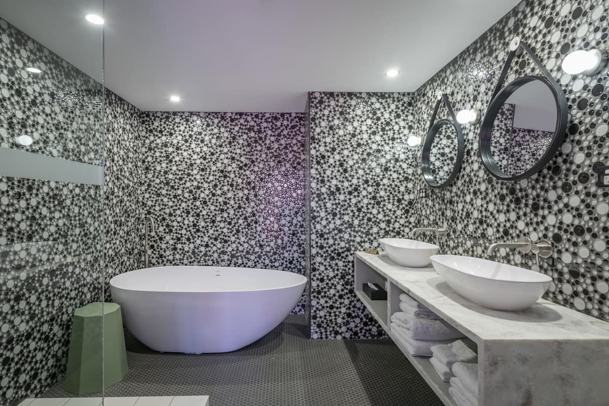 dotty suite | bathroom | hair dryer, towels, soap, shampoo