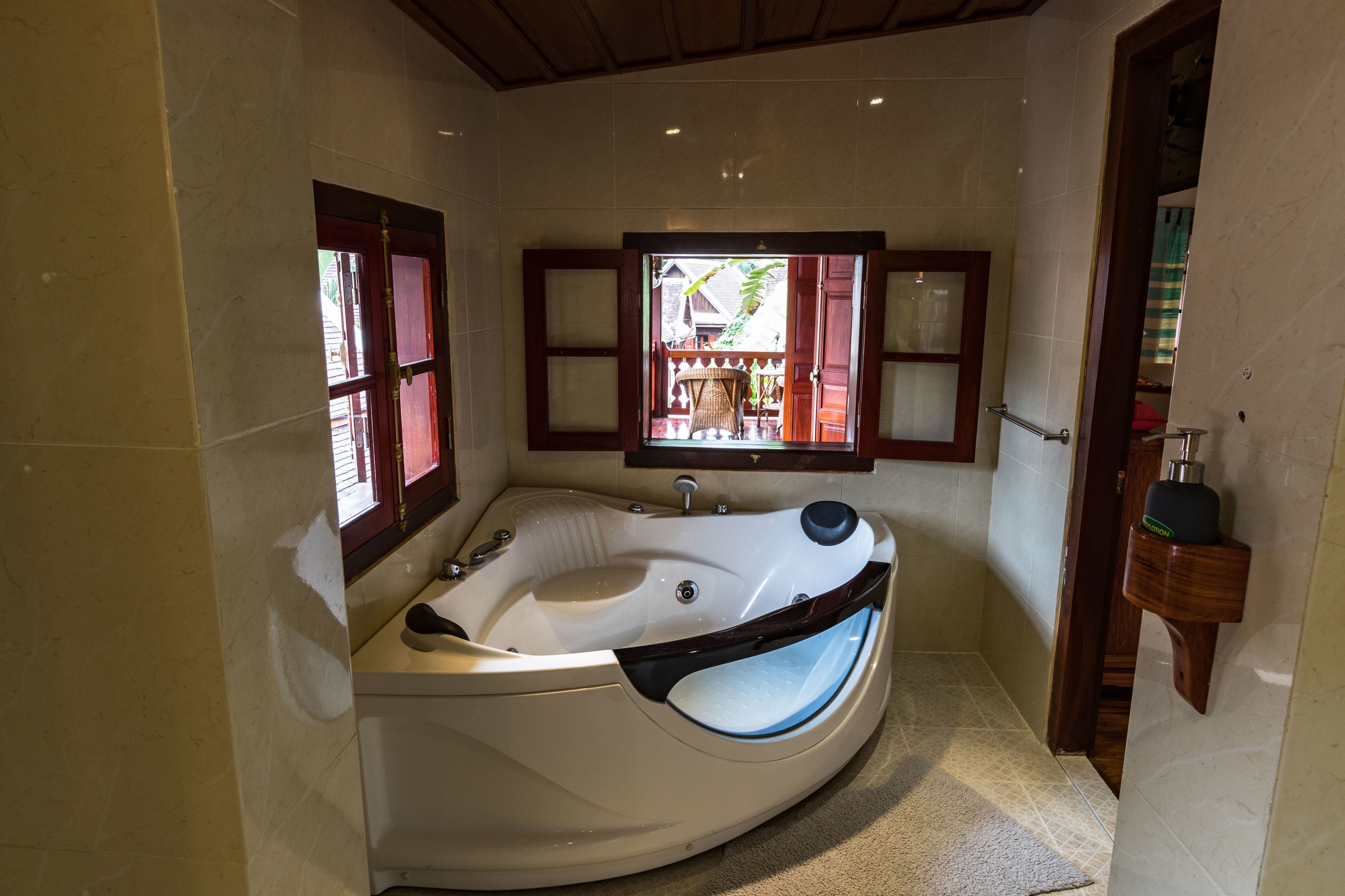 superior suite side view - double | bathroom | shower, rainfall showerhead, free toiletries, hair dryer