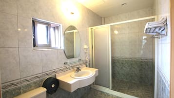 Quadruple Room, Balcony | Bathroom | Deep soaking tub, free toiletries, hair dryer, slippers