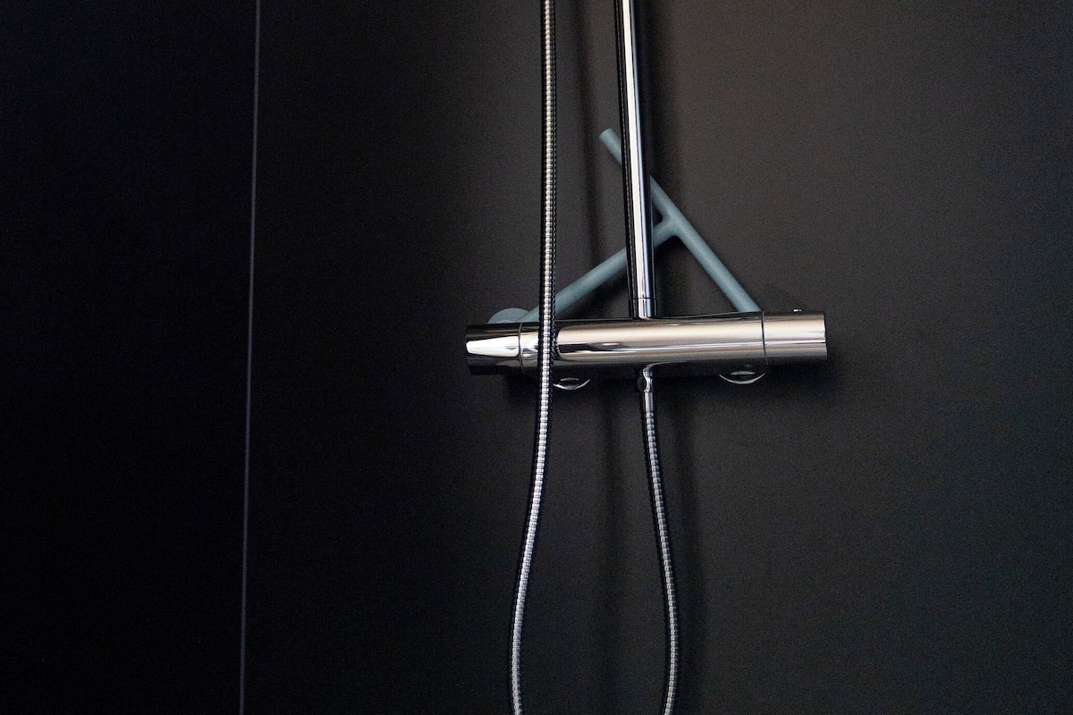 cabin | bathroom | shower, hair dryer, towels