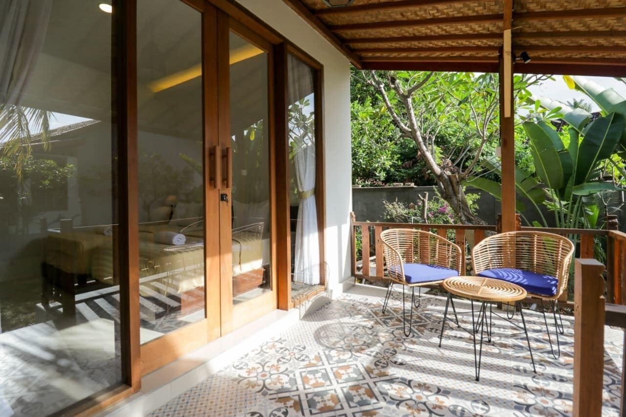 Deluxe Room, Garden View | Balcony view