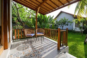 Deluxe Room, Garden View | Balcony view