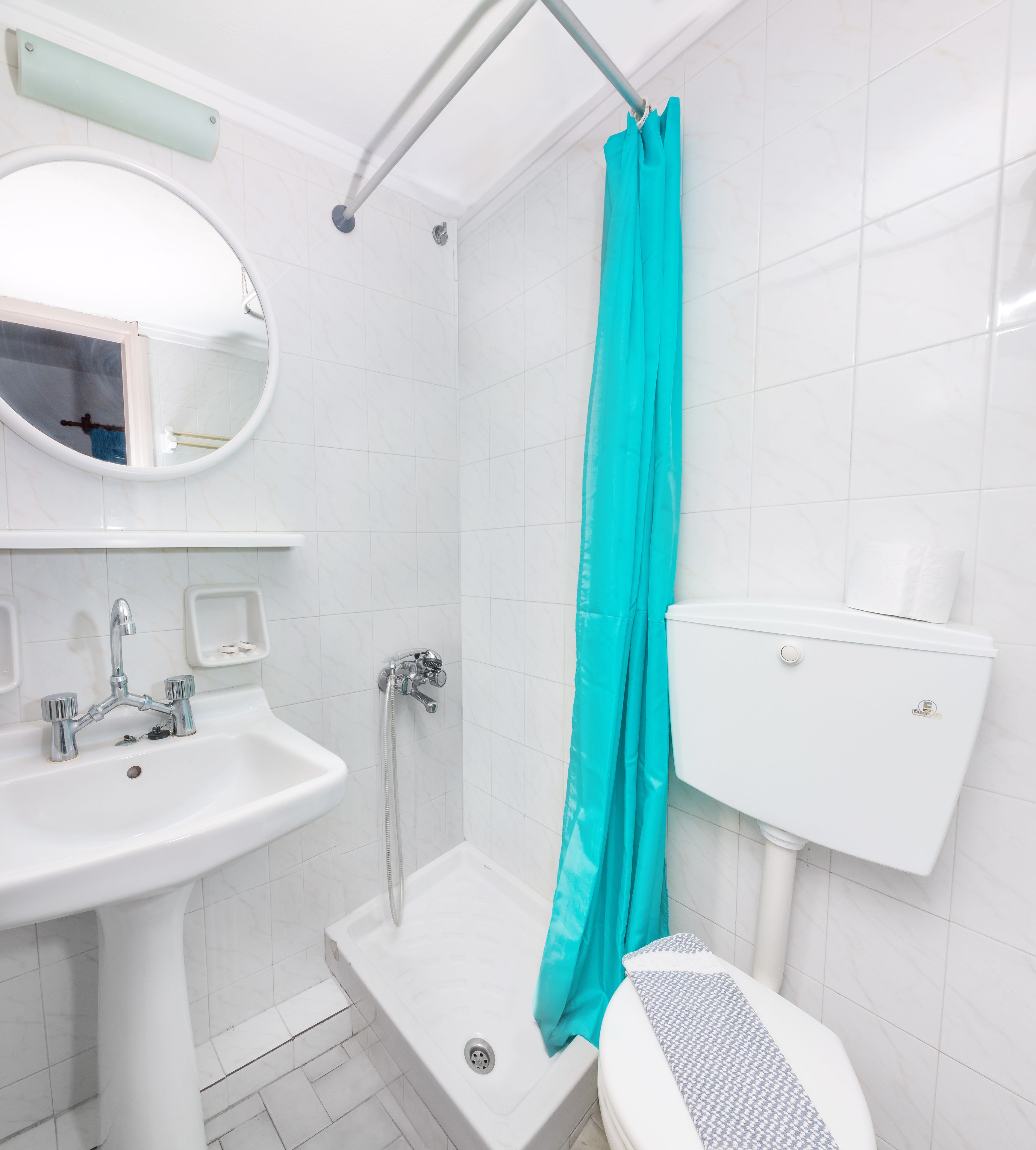 standard studio (large) | bathroom | shower, rainfall showerhead, hair dryer, towels