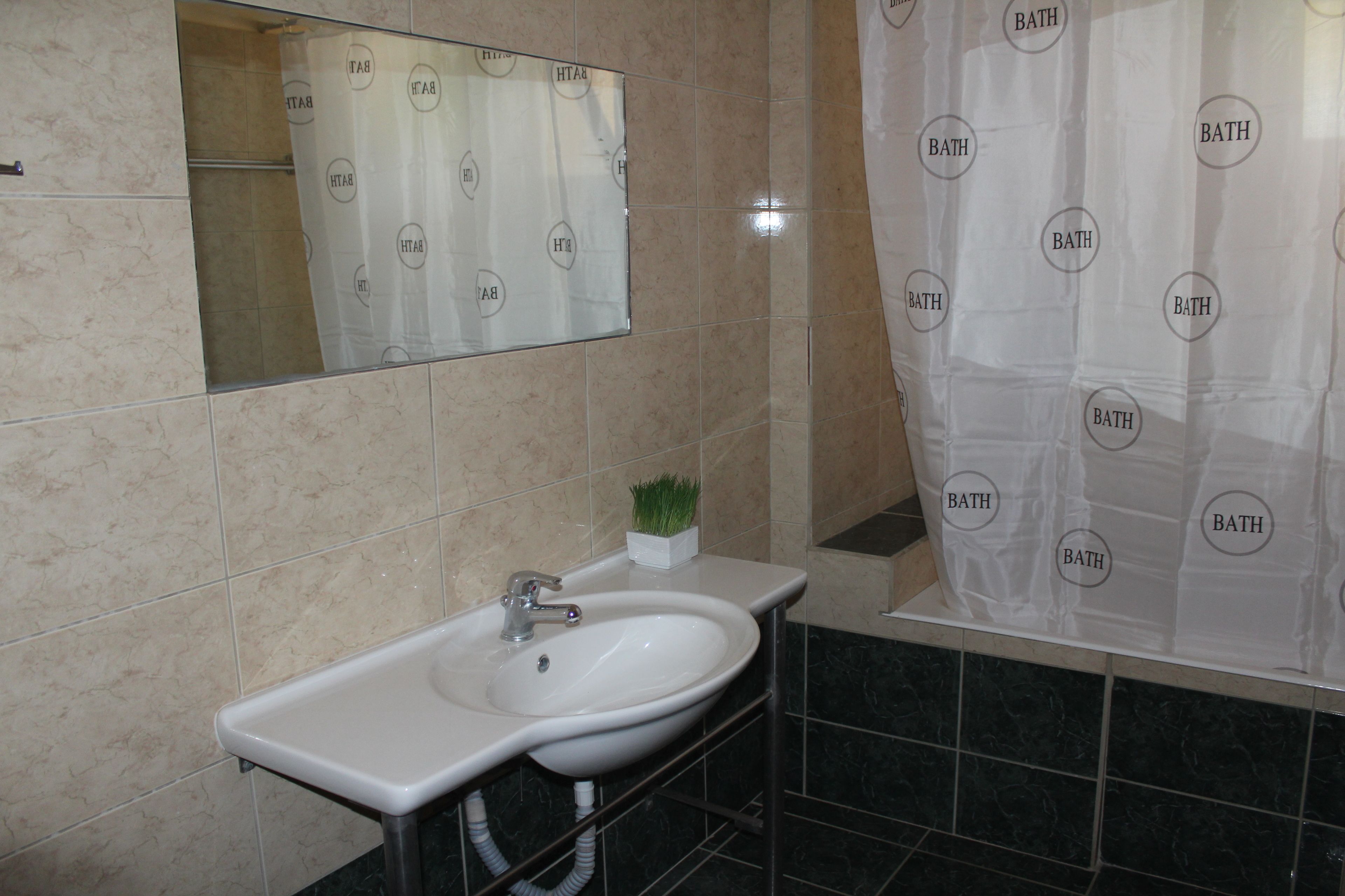 shower, rainfall showerhead, hair dryer, towels