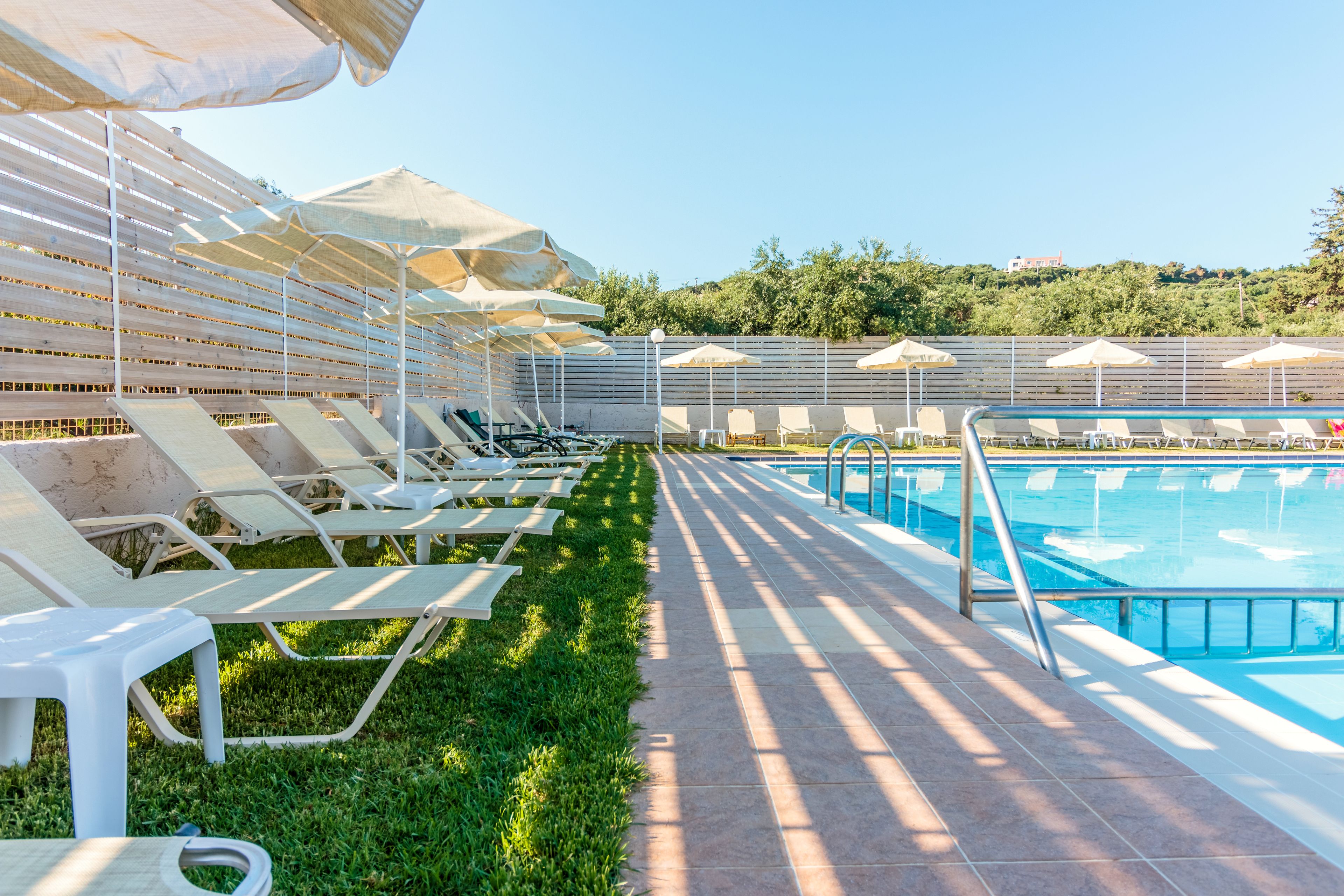 2 outdoor pools, pool umbrellas, pool loungers