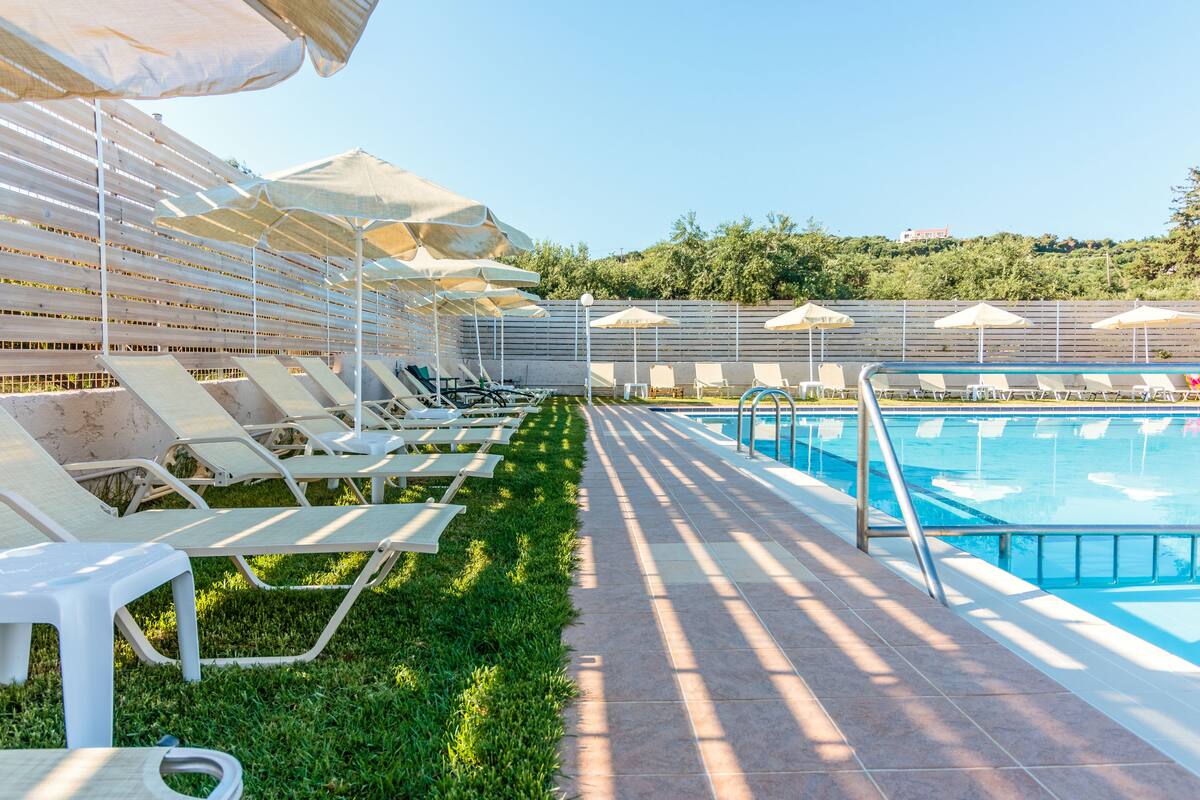 2 outdoor pools, pool umbrellas, pool loungers