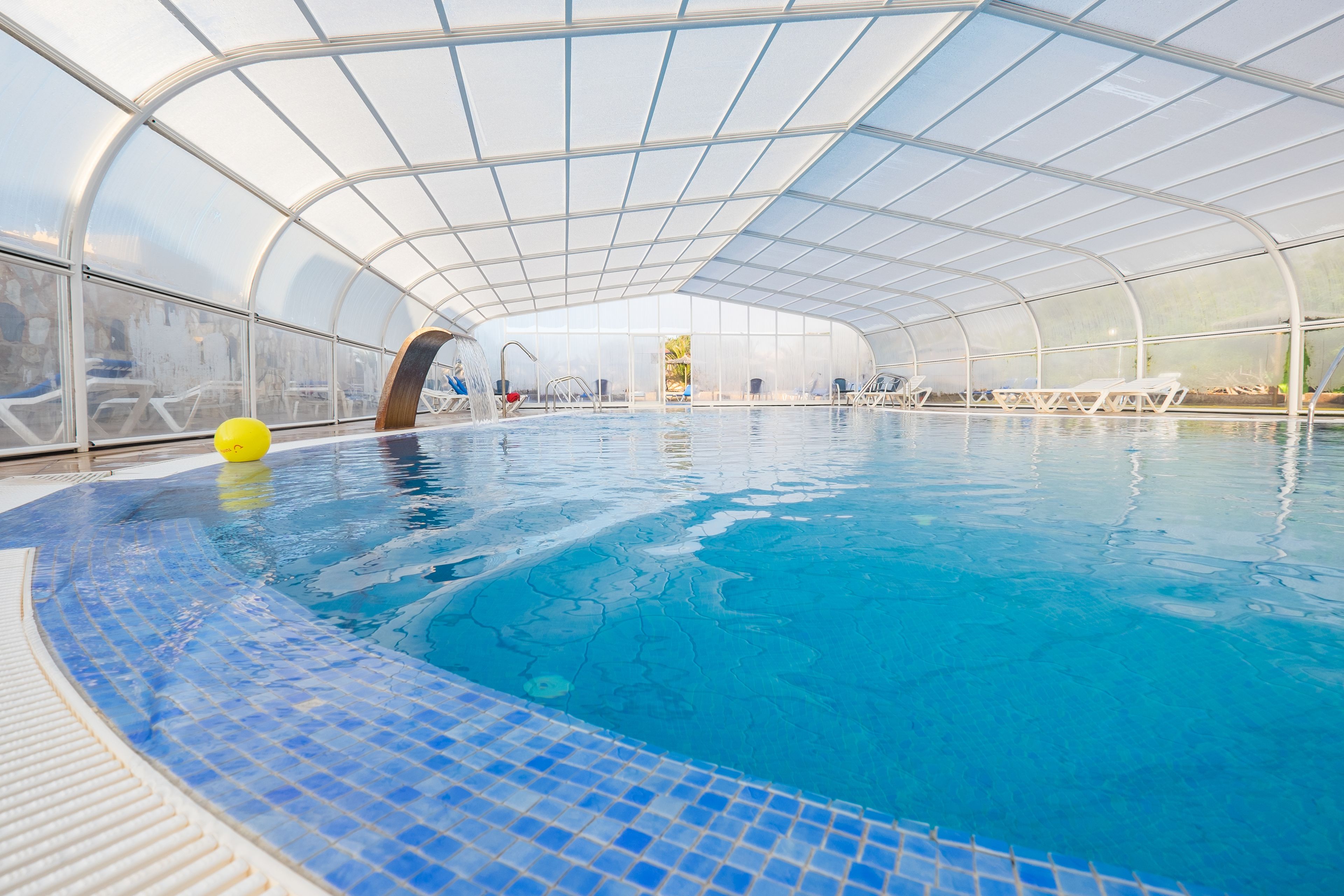 indoor pool, outdoor pool, pool umbrellas, pool loungers