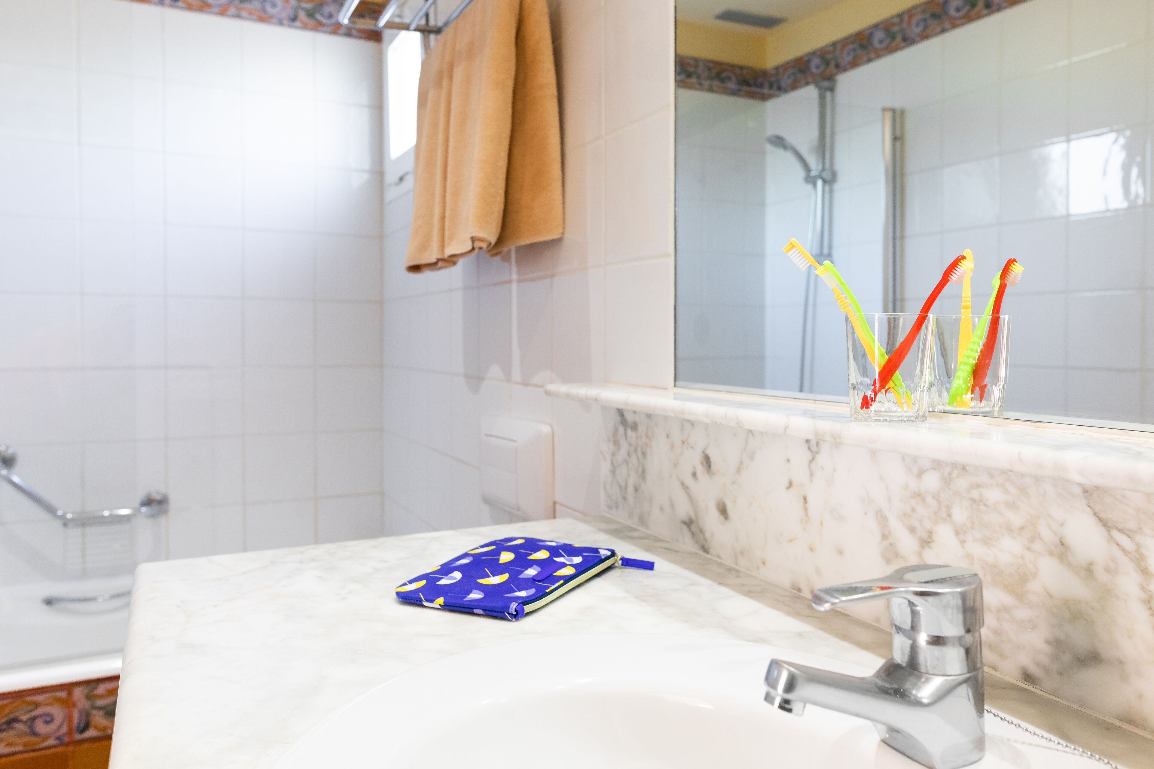 bathtub, free toiletries, hair dryer, towels