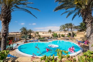 Indoor pool, outdoor pool, pool umbrellas, sun loungers