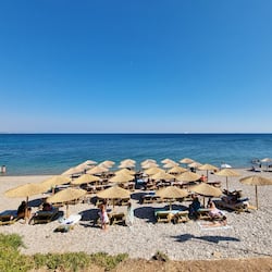 On the beach, sun-loungers, beach umbrellas