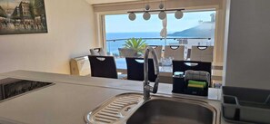Deluxe Penthouse, 3 Bedrooms, Sea View | Private kitchen | Full-size fridge, oven, stovetop, highchair