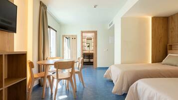 Standard Apartment, Balcony | Living area | 22-inch flat-screen TV with satellite channels, TV