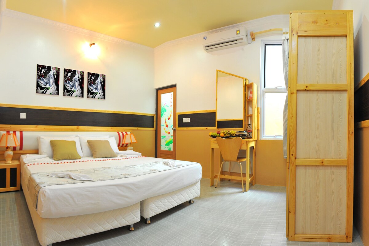 Chambre Double Deluxe | Coin séjour