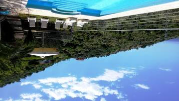 Outdoor pool, pool umbrellas, pool loungers