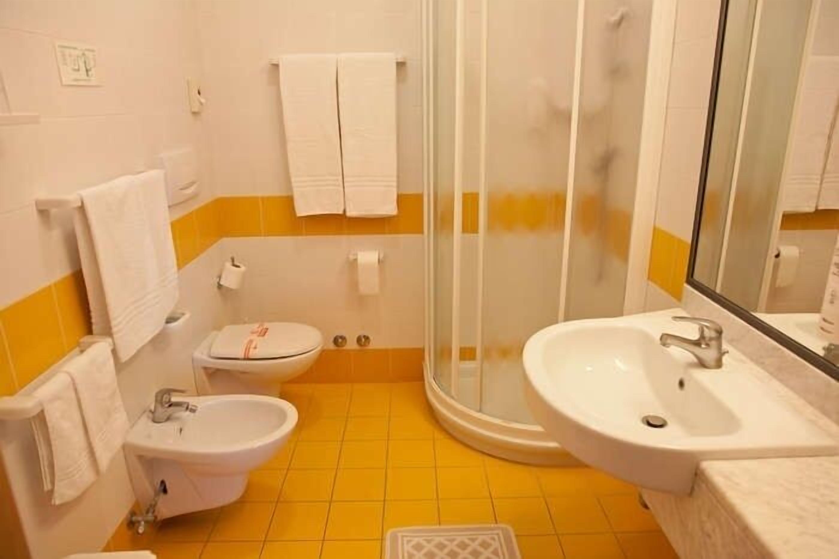 superior double room | bathroom | shower, free toiletries, hair dryer, slippers
