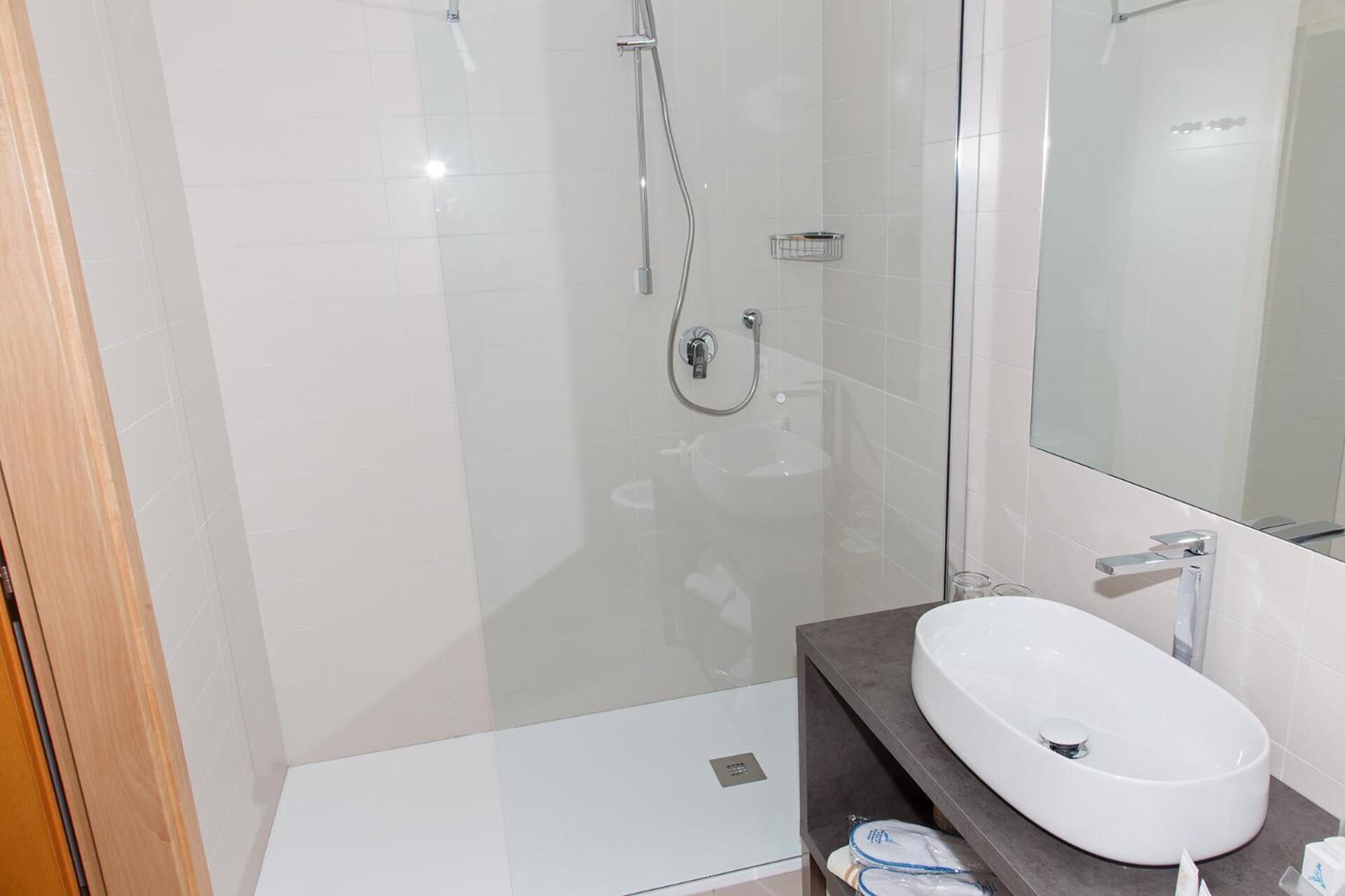 shower, free toiletries, hair dryer, slippers