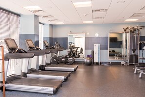A gym with treadmills, elliptical machines, and weight equipment. - Four Points By Sheraton At Phoenix Mesa Gateway Airport (Mesa)