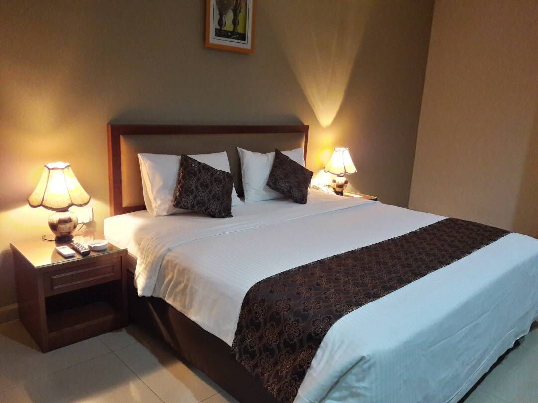 Desk, blackout drapes, iron/ironing board, rollaway beds