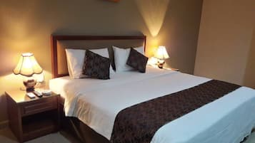 Desk, blackout curtains, iron/ironing board, rollaway beds