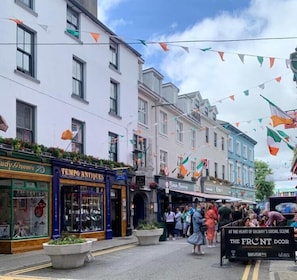 Experience the vibrant atmosphere of Galway's bustling streets, lined with unique shops and traditional European architecture.