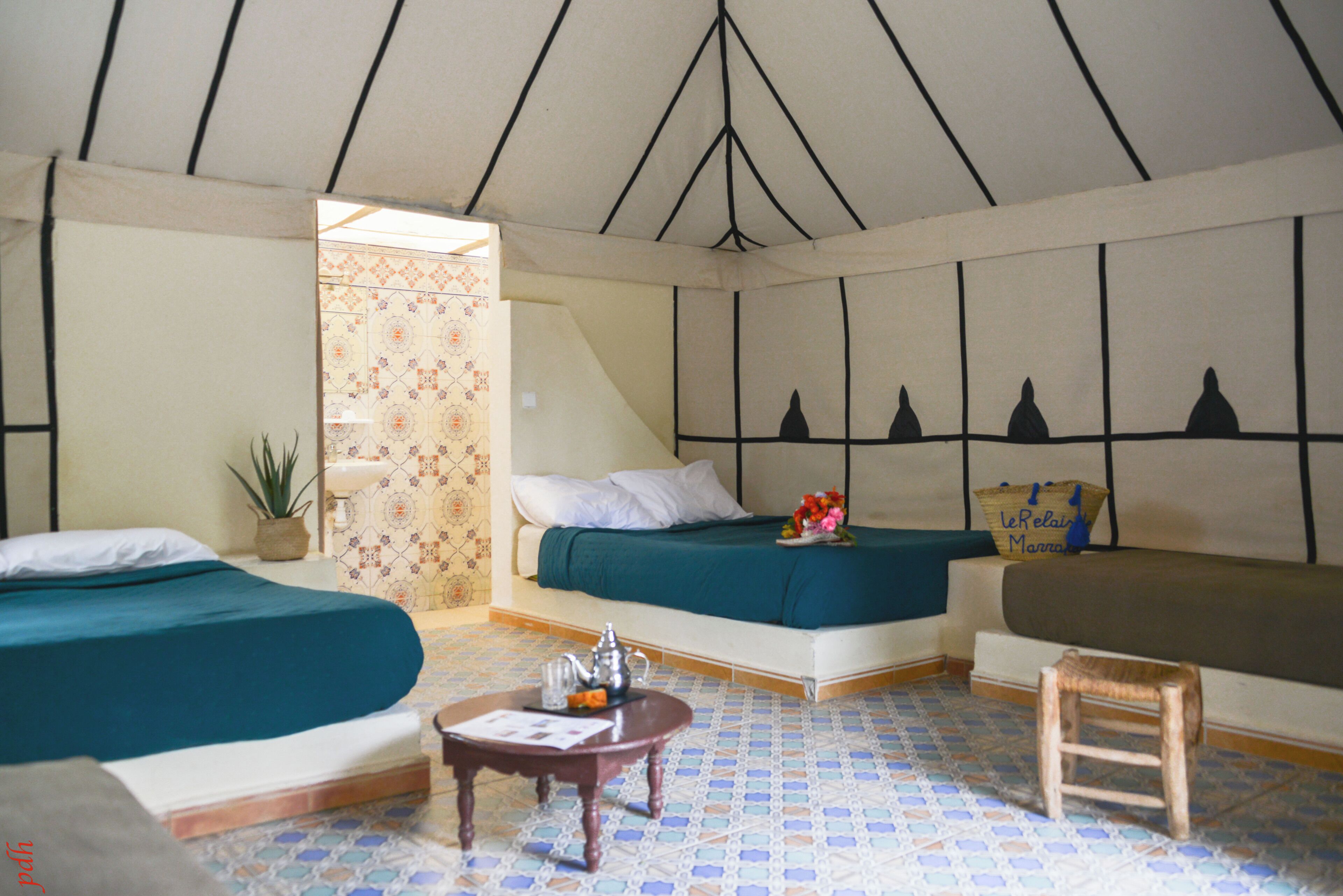 Deluxe Tent | Blackout drapes, bed sheets