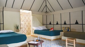 A room with a bed, a sofa, a small table, and a bench. - Le Relais De Marrakech (Marrakech)