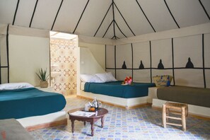 Deluxe-telttamajoitus | Pimennysverhot, vuodevaatteet