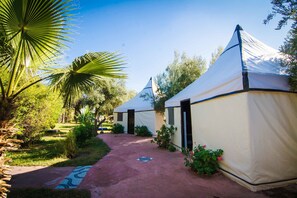 Deluxe Tent | Blackout drapes, bed sheets