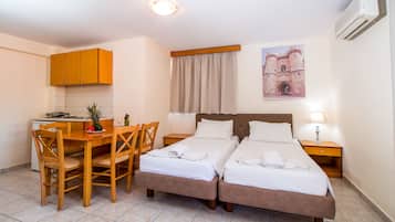 Habitación familiar | Caja fuerte, cortinas opacas, sistema de insonorización y wifi gratis