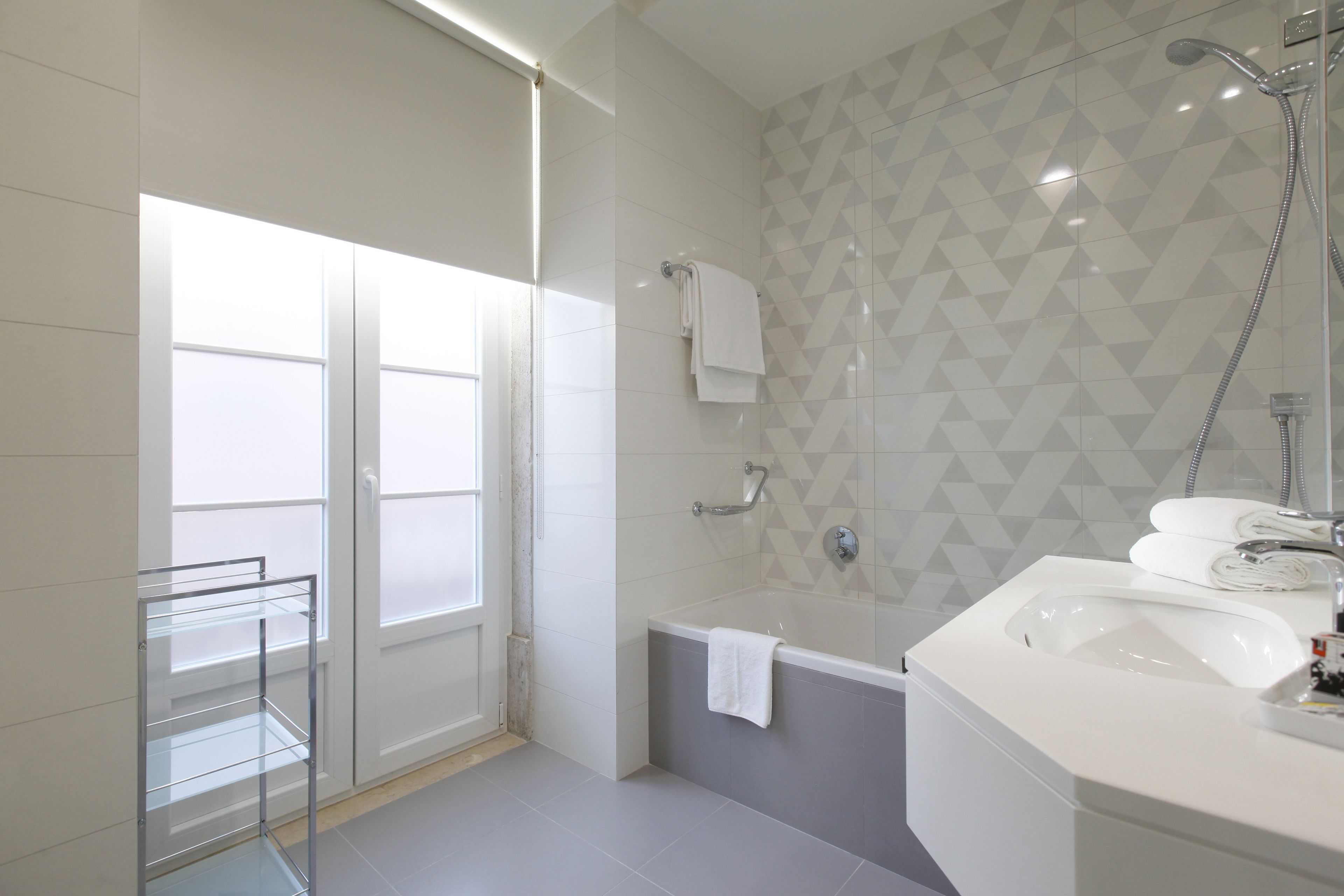superior double room (street view) | bathroom | deep-soaking bathtub, designer toiletries, hair dryer, bathrobes
