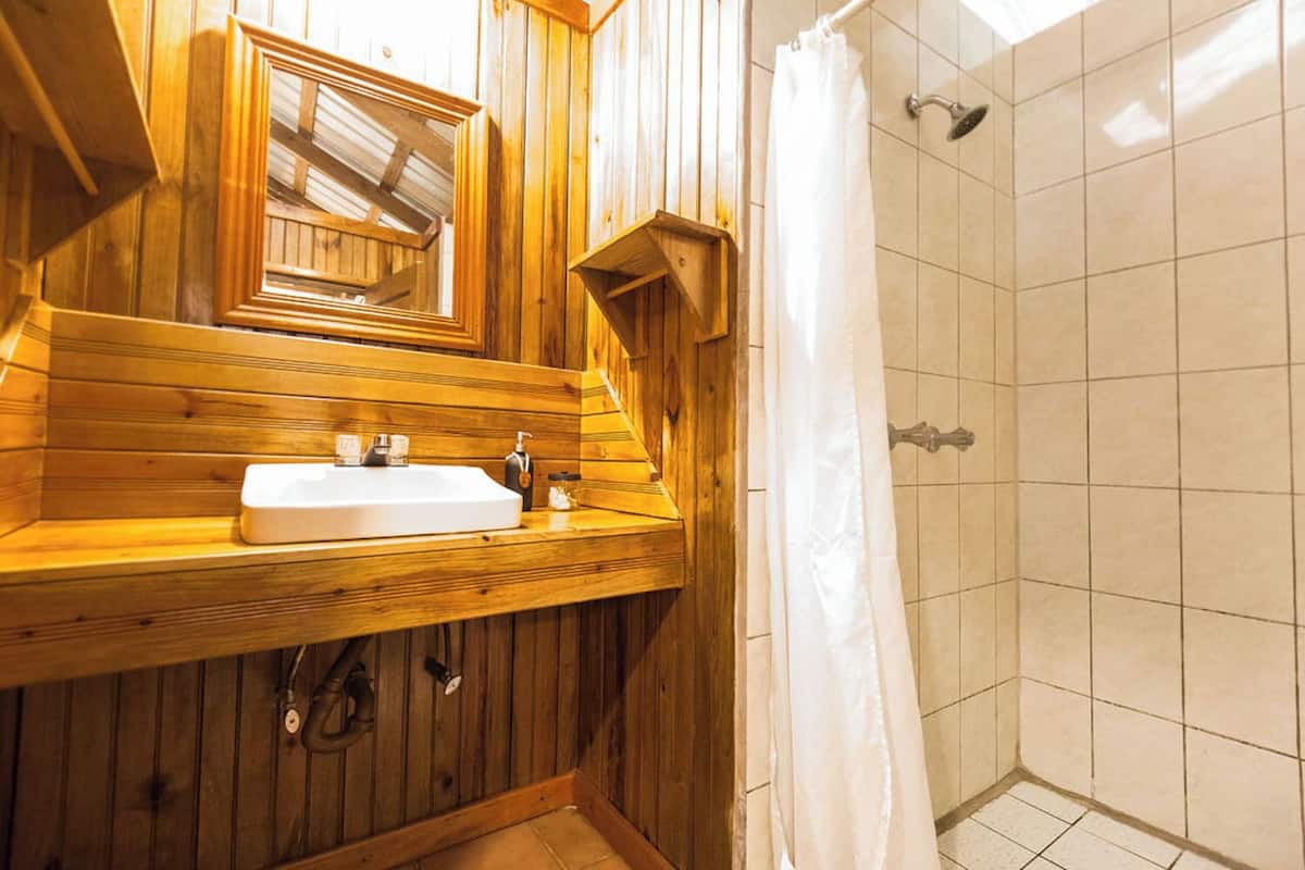 exclusive cabin, 2 bedrooms, garden view, garden area | bathroom | shower, eco-friendly toiletries, hair dryer, towels