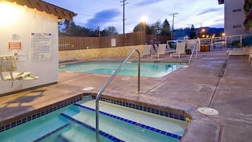 Outdoor pool, open 9:00 AM to 9:00 PM, pool loungers