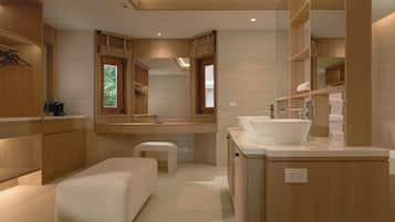 Designer toiletries, hair dryer, bathrobes, slippers