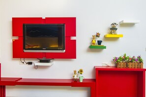 Chambre quadruple Deluxe | Ameublement unique, rideaux d’obscurcissement, système d’insonorisation