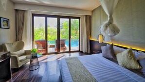 A bedroom with a large bed, a chair, a small table with a plant, and a view of a pool through a sliding glass door. - Ren Resort (Sihanoukville)