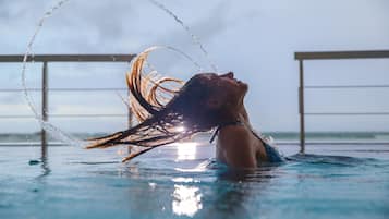 Outdoor pool, pool umbrellas, sun loungers
