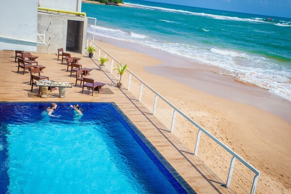 Outdoor pool, pool umbrellas, pool loungers