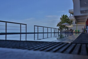 Outdoor pool, pool umbrellas, pool loungers