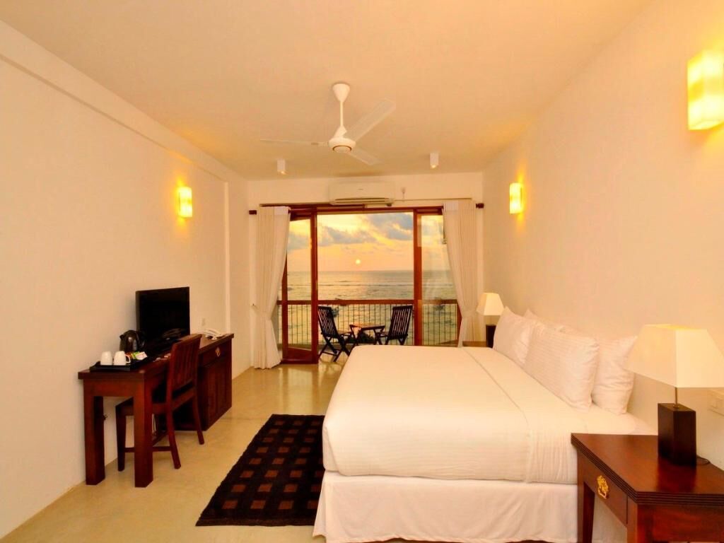 Roupas de cama premium, frigobar, cofres nos quartos, escrivaninha