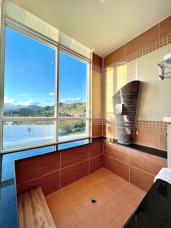 Deluxe Double Room, Bathtub, Mountain View | Bathroom | Free toiletries, hair dryer, slippers, towels