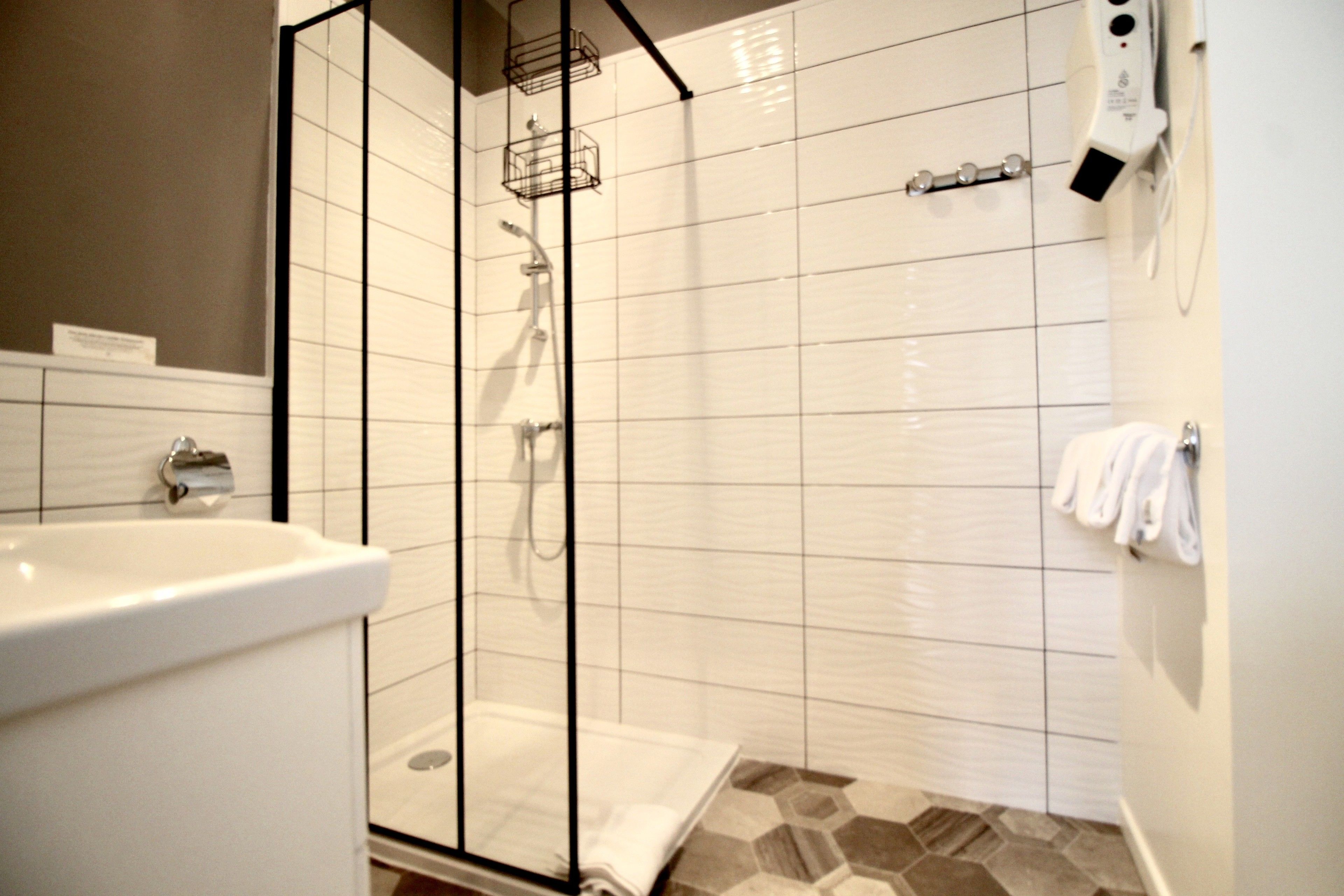 shower, free toiletries, hair dryer, towels