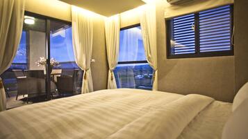 Family Quadruple Room, Multiple Beds | Down comforters, minibar, laptop workspace, blackout drapes