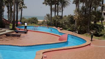 Outdoor pool, pool umbrellas, pool loungers